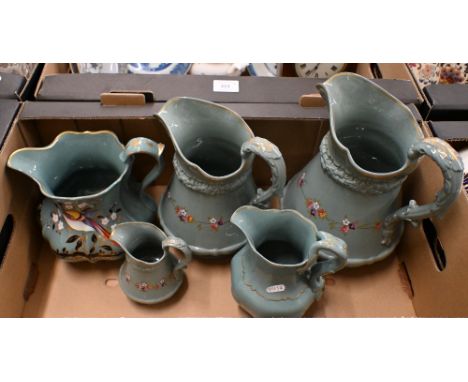 Three Victorian Ridgway green-glazed jugs in differing sizes, with moulded decoration and floral printed and painted bands, 2