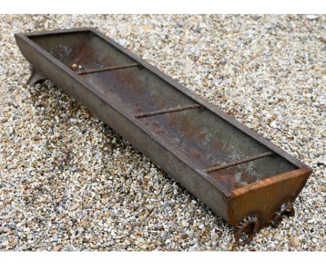 A cast iron feeding trough or garden planter with dividing bars, 105 cm w x 30 cm d x 16 cm h