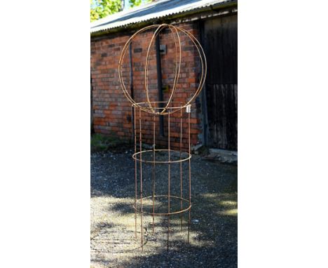 A weathered steel ball on stand sweet pea garden plant frame, 140 cm highPlease note stock image