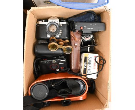 A cased pair of Trentor 10 x 50 binoculars to/w a Pentax S1a slr camera, Kodak SIX-20 folding camera, two pocket cameras and 