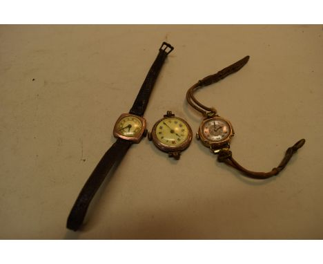 Two vintage 9ct gold ladies wristwatches; and a gold plated example.