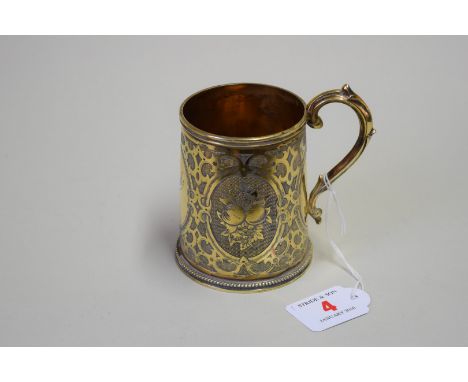 A Victorian silver gilt christening mug, by Andrew Crespel & Thomas Parker, London 1863, of tapered cylindrical form with eng
