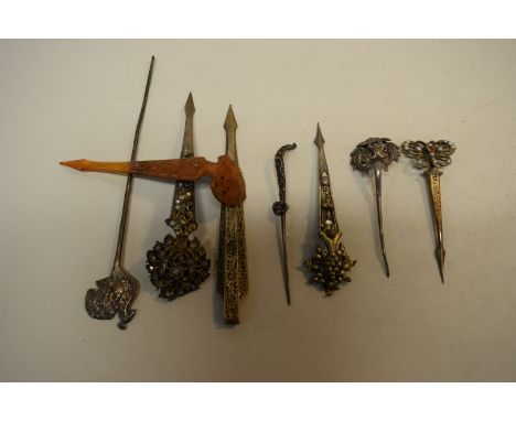 Eight various vintage Sri Lanka hair pins.