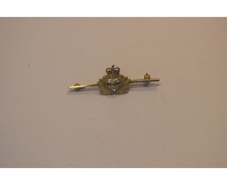 A 9ct gold and red enamel Royal Navy crest bar brooch, 5cm, 4.2g total weight.