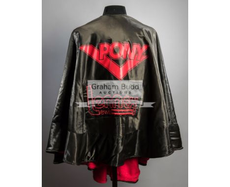 Lennox Lewis boxing ring wear poncho,by Pony with red towelling interior with black satin exterior inscribed LENNOX LEWIS; so