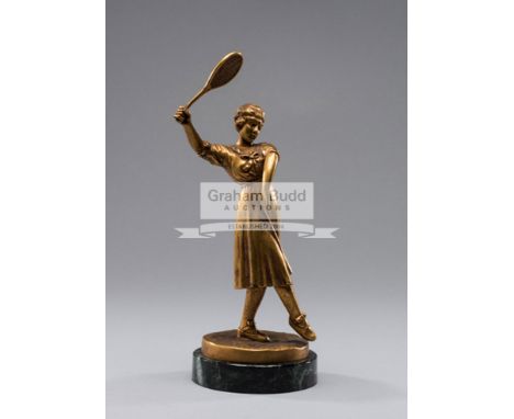 Jose Dunach (Spanish, 1886-1957)LADY TENNIS PLAYERsigned, gilt-bronze on a black marble plinth, height 19cm.