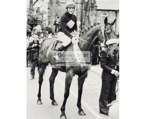 A trio of framed photographs featuring the racehorse "Red Rum" all signed to the backboard by the trainer 'Ginger' McCain,eac
