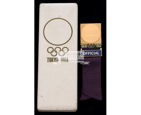 Tokyo 1964 Olympic Games official's badge,gold plate & enamel, inscribed OFFICIAL, purple coloured ribbon, in original case o