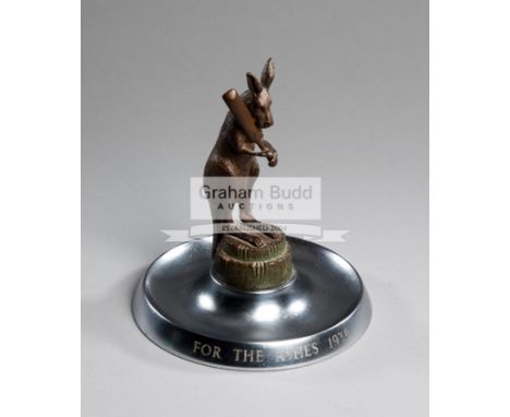 An England v Australia 1938 Ashes Series commemorative trophy,In the form of a bronze model of a kangaroo holding a cricket b