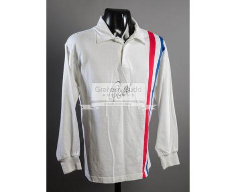 Pele signed 'Escape To Victory" jersey,signed in black marker pen; sold together with a Pele signed scale repro of the Escape
