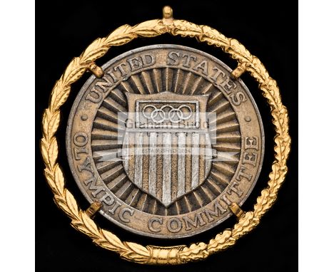 United States Olympic Committee medal designed in the manner of the Rome 1960 Olympic Games prize medal,with an outer encircl