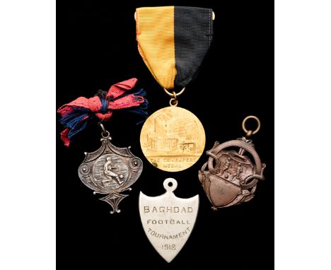 A collection of football memorabilia including medals,including four international football medals, Baghdad Football Tourname