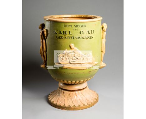 A rare continental stoneware memorial urn for the Austrian motorcycle racer Karl Gall killed during practice for the 1939 TT 