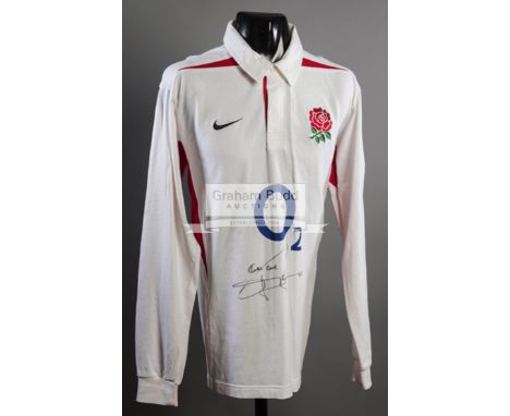 Jonny Wilkinson signed replica England 2003 Grand Slam season rugby shirt,signed below the sponsor's logo and inscribed TAKE 