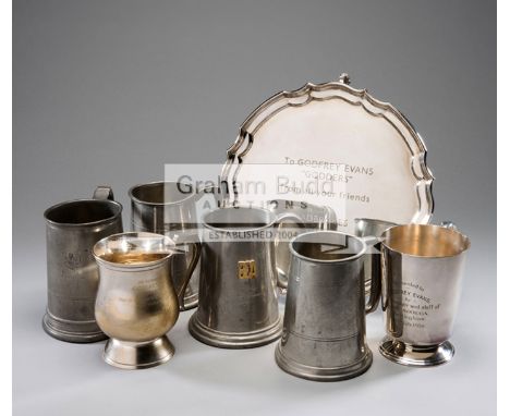 Seven Godfrey Evans presentations,comprising: two silver-plated tankards, the first from British Gas and commemorating a post