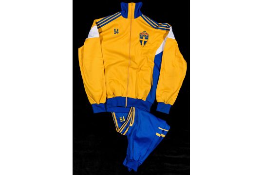 blue and yellow adidas tracksuit