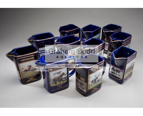 A collection of 11 Martell Grand National water jugs,for 1989 Little Polveir, 1990 Mr Frisk, 1991 Seagram, 1992 Party Politic