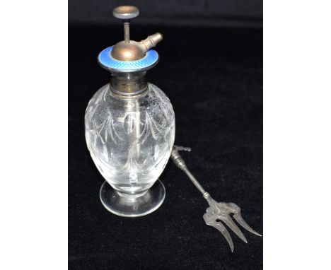 A PERFUME BOTTLE AND SILVER NEPTUNE FORK the glass perfume bottle with blue Guilloche enamel detail to the rim, standing 16cm