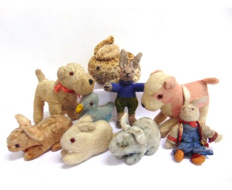 ASSORTED SOFT TOYS  comprising two dogs, six rabbits, and a Chad Valley duck, most circa 1930s-50s, the largest 22cm long, (9