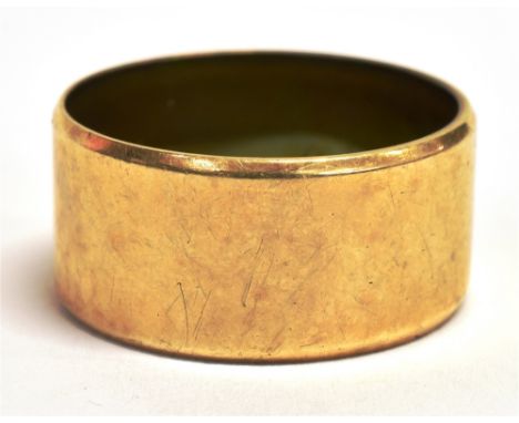 A 9CT GOLD WIDE BAND RING Width 1cm, weight 6g, N.B faded hallmark to the shank