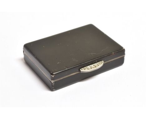 CARTIER: A DIAMOND ACCENT, BLACK ENAMEL, SILVER GILT PILL BOX the box with silver gilt interior, black enamel exterior and di