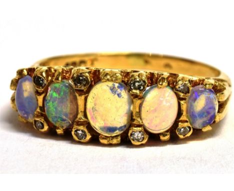 A STAMPED 18CT OPAL FIVE STONE BOAT RING The five oval graduated opals measuring approx 4mm - 5mm in diameter, ring size O, w