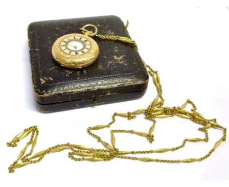 AN 18CT GOLD PLATED HALF HUNTER POCKET WATCH  with an attached gilt long chain, the pocket watch with an engraved floral patt
