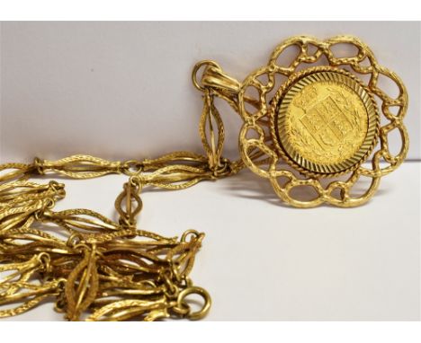 VICTORIA 1873 FULL GOLD SOVEREIGN mounted in 9ct gold with an attached long yellow metal fancy link chain, chain length 75cm,