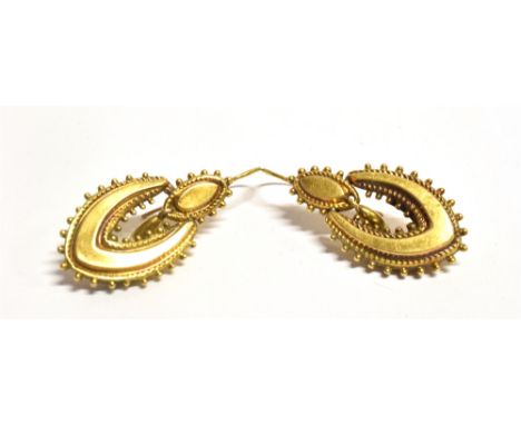A PAIR OF VINTAGE YELLOW METAL PENDANT DROPS EARRINGS the unmarked earrings with hook backs measuring 2.8 x 1.7cm at widest p