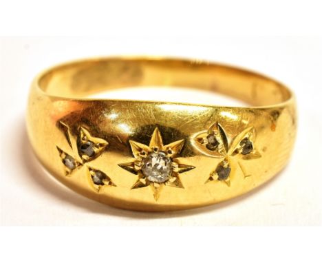 AN 18CT GOLD OLD CUT DIAMOND STAR SET RING the shank with worn marking, testing indicating 18ct, ring size R ½ , weight 3.92g