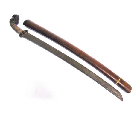 MILITARIA - A MALAY KLEWANG  of typical form, the 53.5cm slightly curved blade with decorative, wavy forging, the hardwood hi