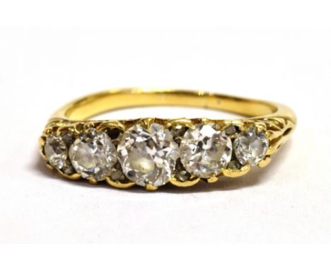 AN OLD CUT DIAMOND FIVE STONE BOAT RING The five graduated diamonds measuring approx 2,5mm -- 3,5mm in diameter, on an unmark