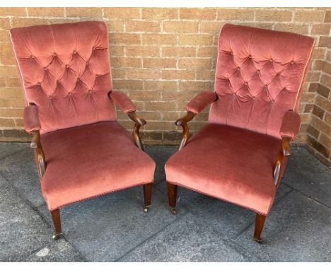A PAIR OF MAHOGANY FRAMED ARMCHAIRS  with button upholstered backs, on square tapering supports