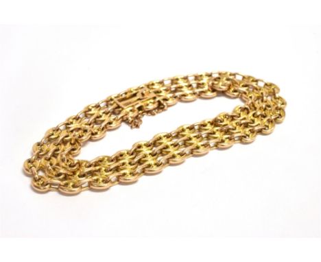 A STAMPED 15 YELLOW METAL TRIPLE ROW MARINER LINK BRACELET The bracelet fitted with a push clasp and safety chain, width 1.3c