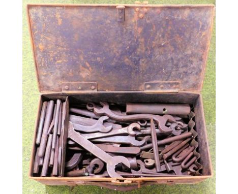 An early 20thC metal toolbox, of rectangular form with handles, 17cm high, 49cm wide, 26cm deep containing a quantity of tool