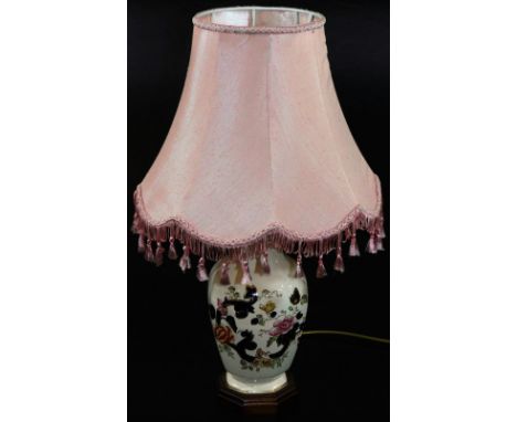 A Mason's Ironstone Mandalay pattern table lamp, with pink shade on wooden plinth base, 52cm high.