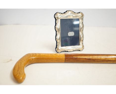 Sterling silver photo frame together with a walking stick 