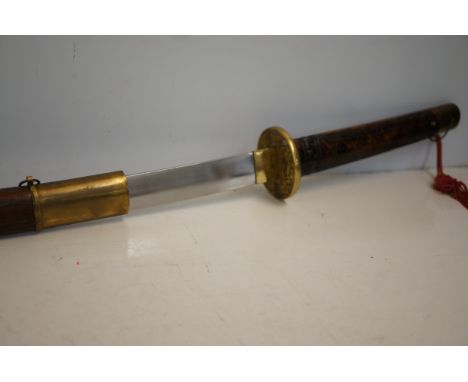 Good quality possibly Bali sword with scabbard