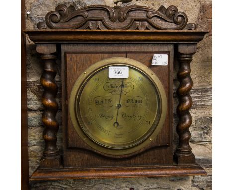 CARVED OAK BAROMETER