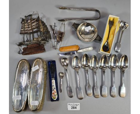 Box of oddments to include: two silver engine turned ladies' hairbrushes, white metal study of a Junk ship, various flatware,