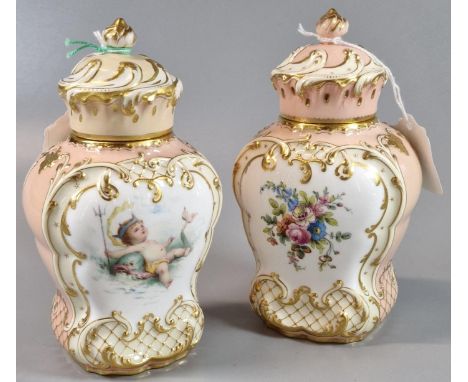 Pair of Mintons porcelain tea caddies, signed by A Boullemier, of baluster form having scrolled covers with finials and decor