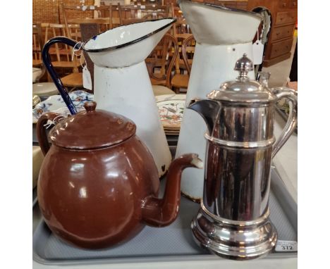 Two similar vintage enamel conical jugs together, with a brown enamel teapot and a silver plated communion/water jug. (4) (B.