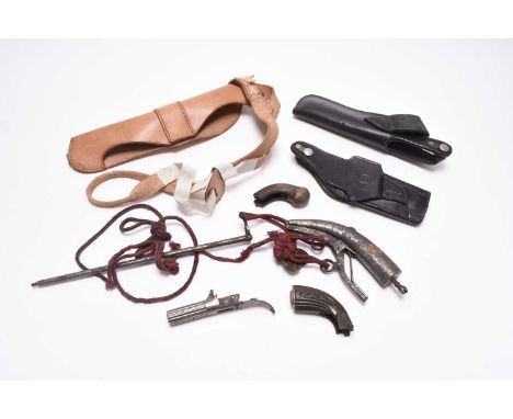 An Ottoman priming flask, 19th century, sold together with three modern pistol holsters and a group of spare 19th century pis