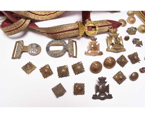 A Victorian sword belt, buckle and insignia grouping, 62nd Regiment of Foot (Wiltshire) interestcomprising a 62nd Regiment wa