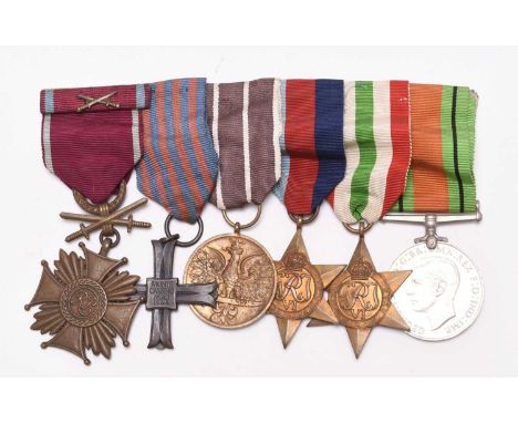 A Second World War Polish medal group, comprising bronze Order of Merit with Swords, Monte Cassino Commemorative Cross, numbe