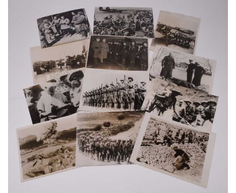 PRESS PHOTOGRAPHY. Second World War Chinese military subjects, circa 1939-45. Twelve black and white photographs issued by Ke