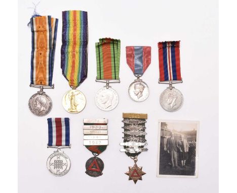 A First and Second World War medal group comprising a British War Medal and Victory Medal [300106 PTE. W.E. CULLIMORE R. WAR.