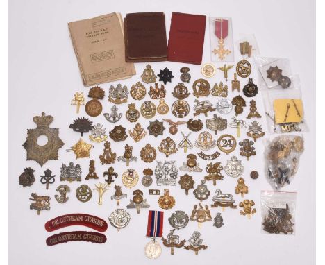 A mixed group of assorted badges and cloth insignia, including re-strikes and reproductions, including a Boer-war related sil