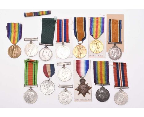 A group of assorted medals, comprising three 1939-45 War Medals, two Defence Medals, a WW1 pair of 1914-18 Medal and a Victor