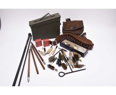 A cartridge case containing an assortment of gun cleaning tools, together with a cartridge bag, together with a leather cartr